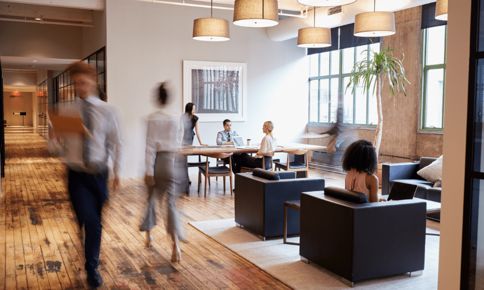 Lobby of a business with people working